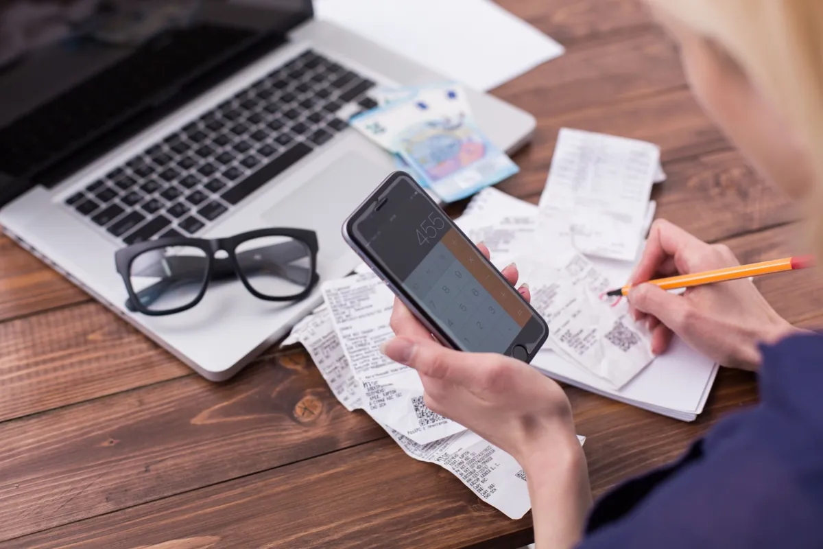 business-technology-office-writing-laptop-computer-desk-calculator-payment-business-woman_t20_4ld6ol-1.jpg