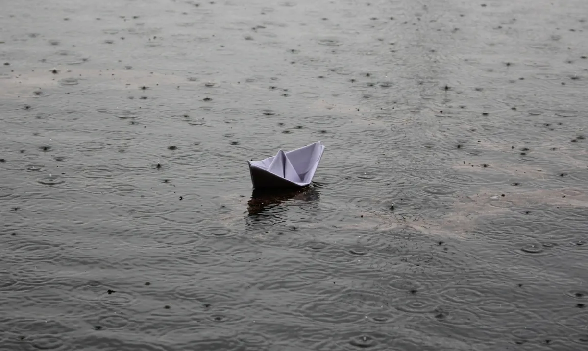 mitodru-ghosh-paper-boat-on-water-unsplash.jpg